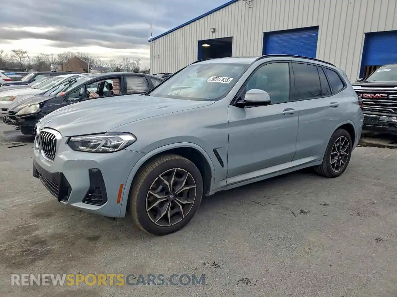 1 Photograph of a damaged car 5UX53DP08N9N08728 BMW X3 2022