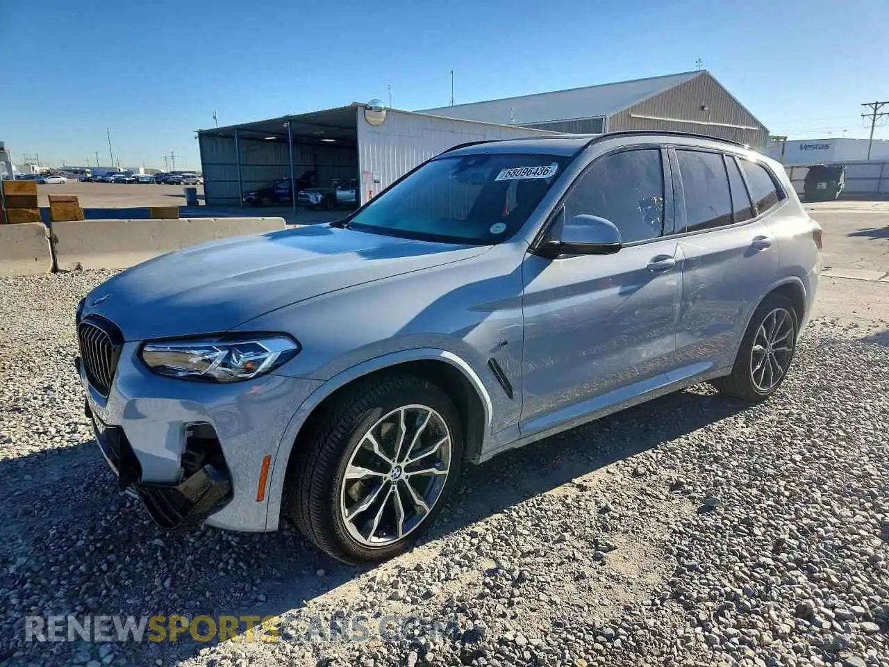 1 Photograph of a damaged car 5UX53DP09N9M63492 BMW X3 2022