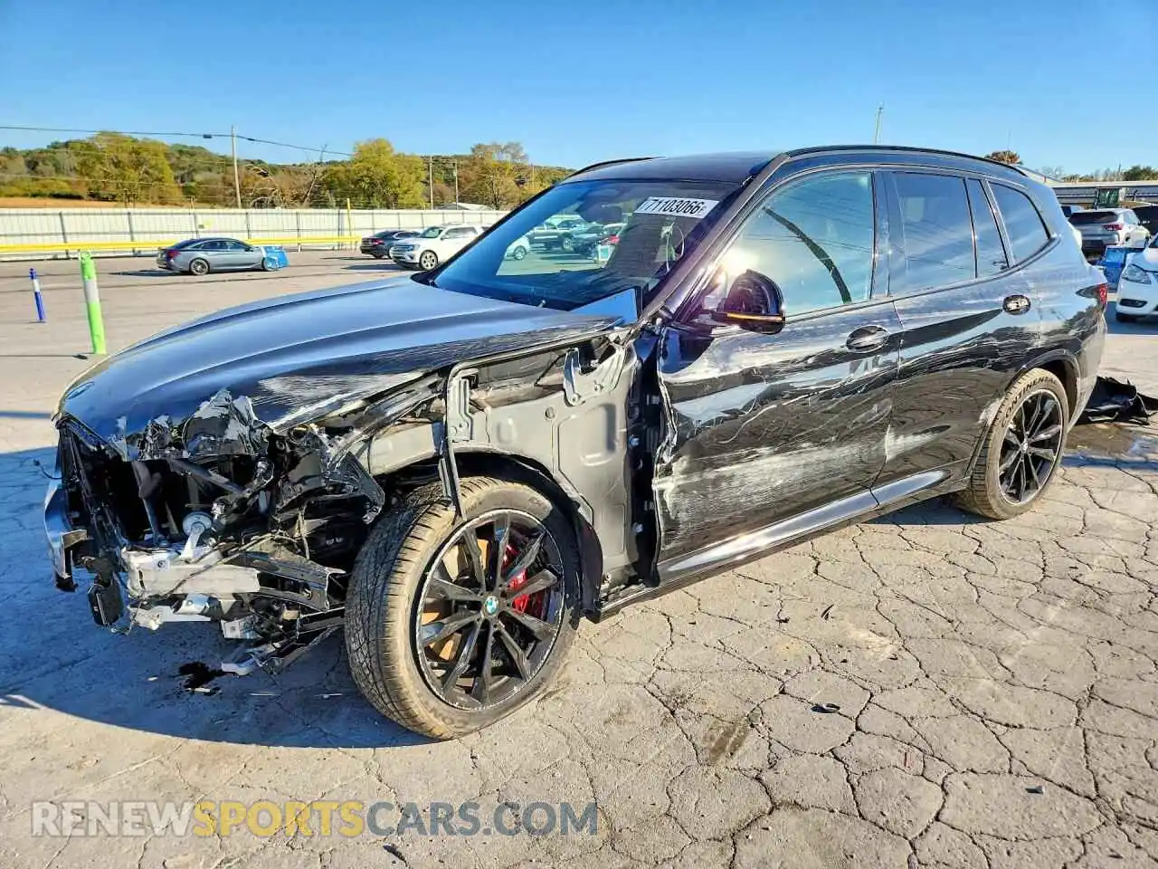 1 Photograph of a damaged car 5UX83DP01N9L03409 BMW X3 2022