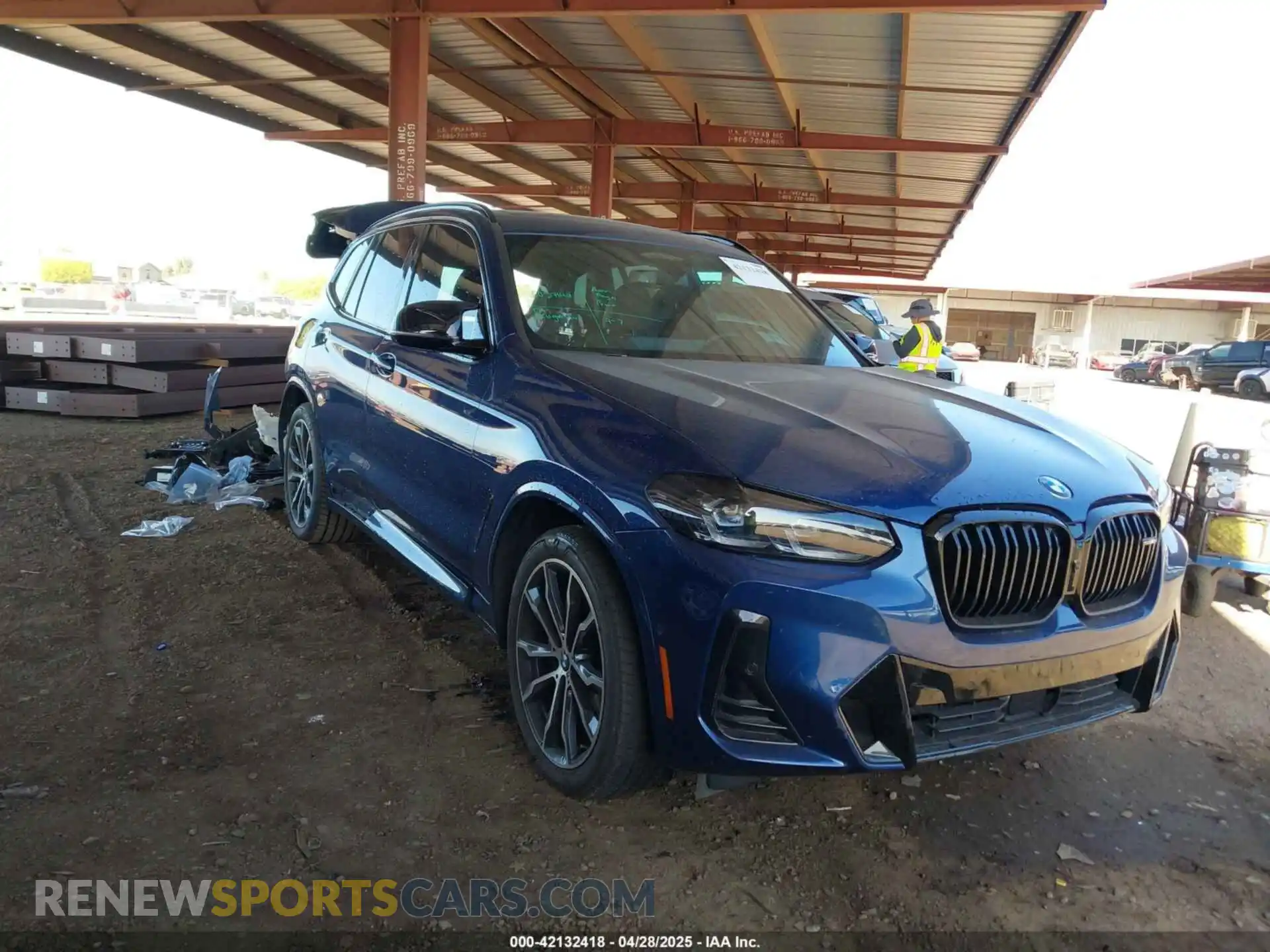 1 Photograph of a damaged car 5UX83DP07N9N22701 BMW X3 2022