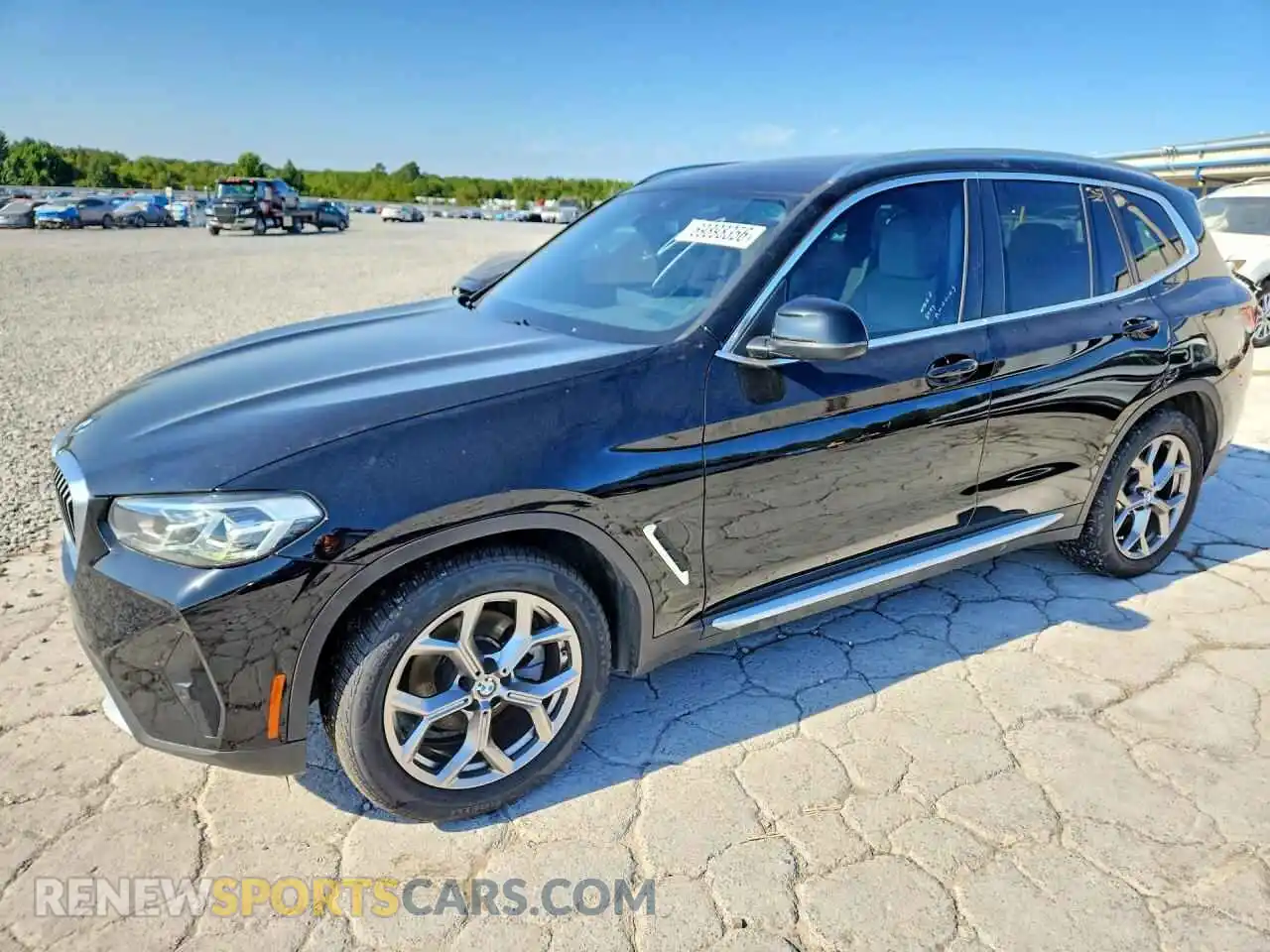 1 Photograph of a damaged car WBX47DP02NN182176 BMW X3 2022