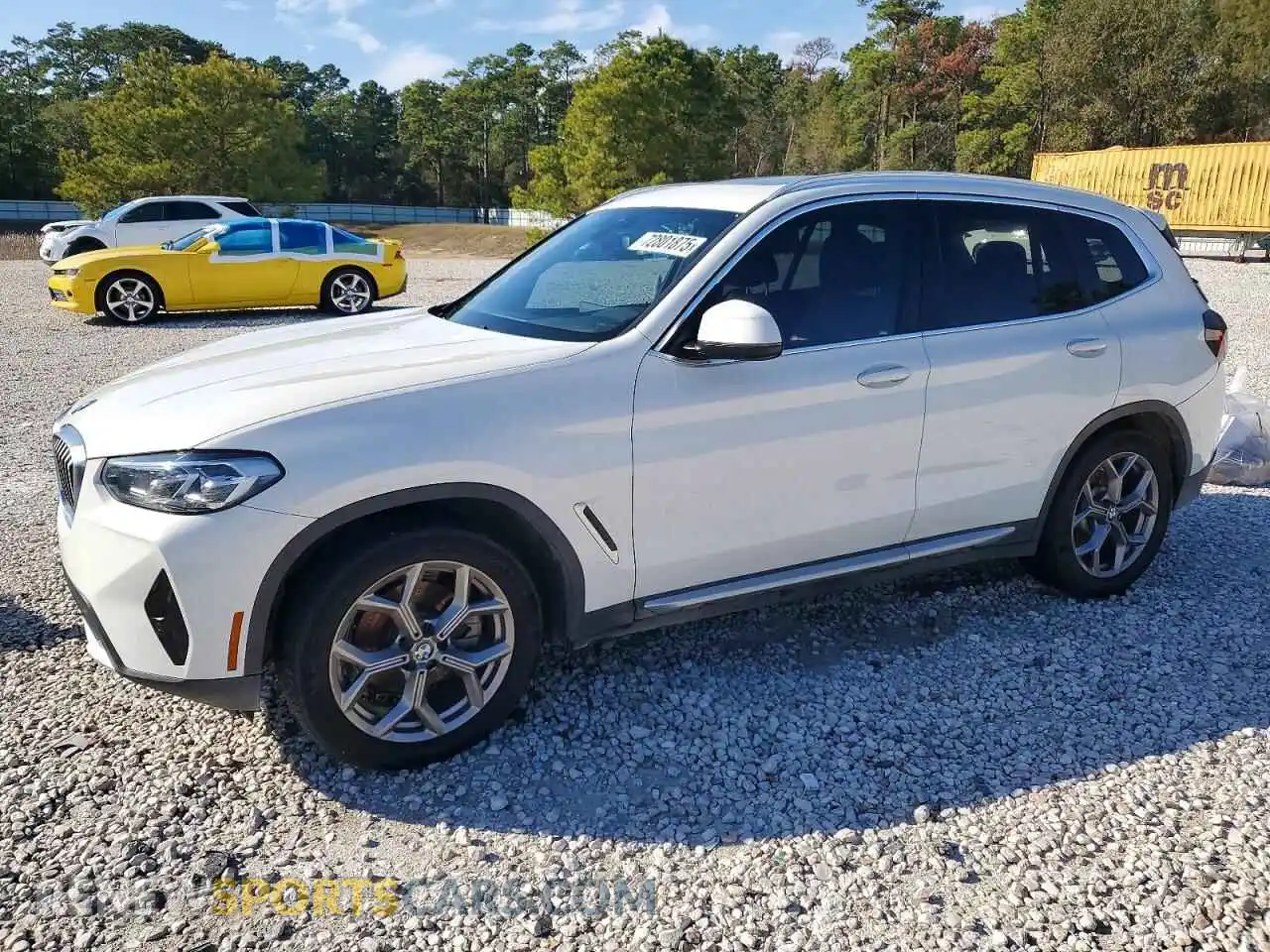 1 Photograph of a damaged car WBX47DP07NN125455 BMW X3 2022