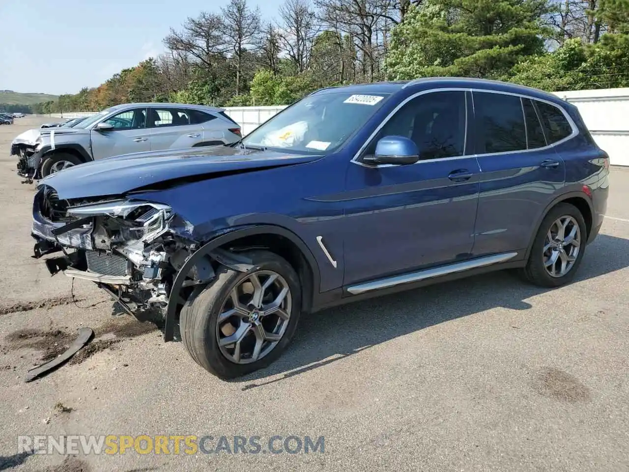 1 Photograph of a damaged car WBX57DP09NN176265 BMW X3 2022
