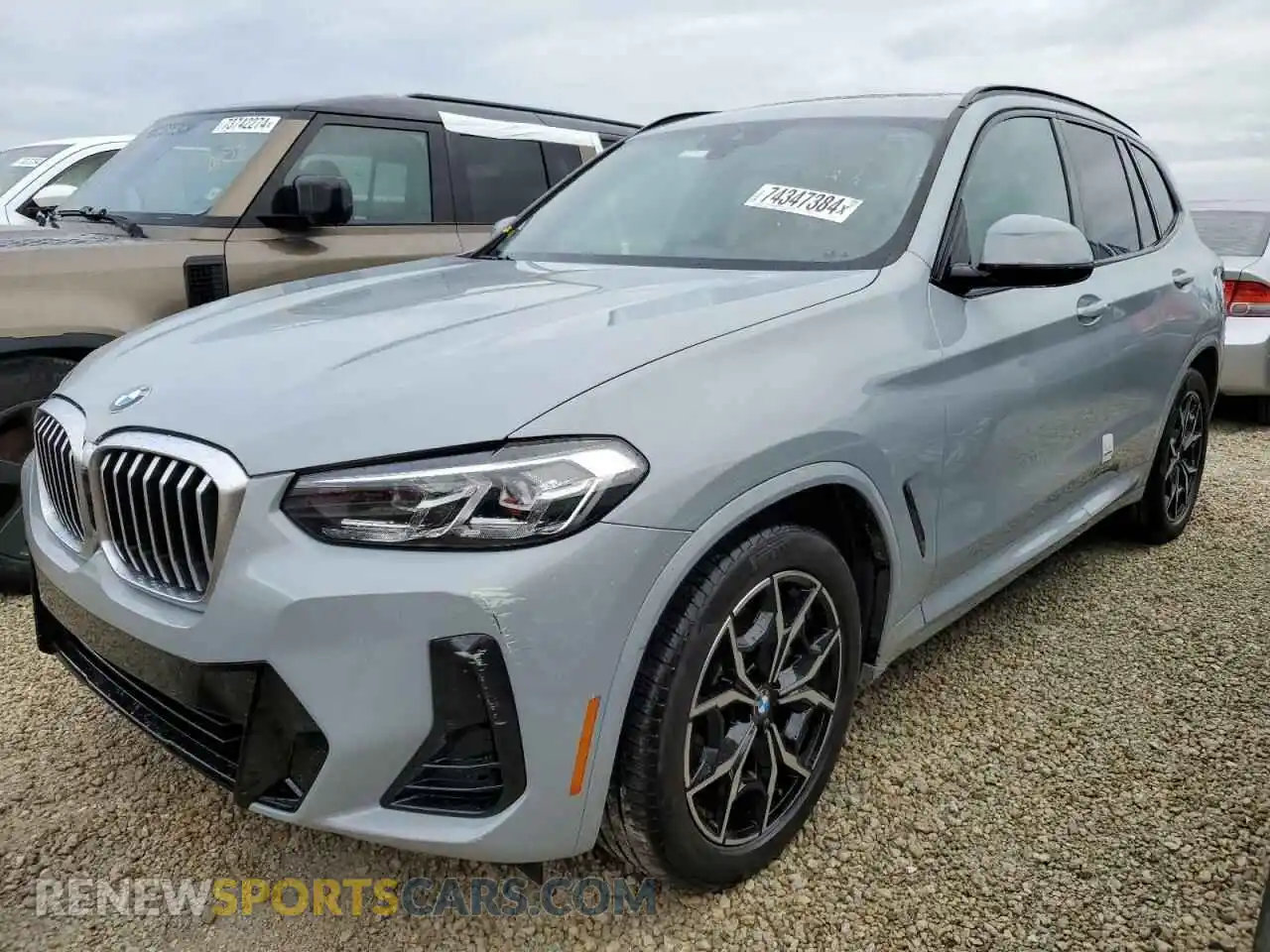 1 Photograph of a damaged car 5UX43DP00P9N56576 BMW X3 2023