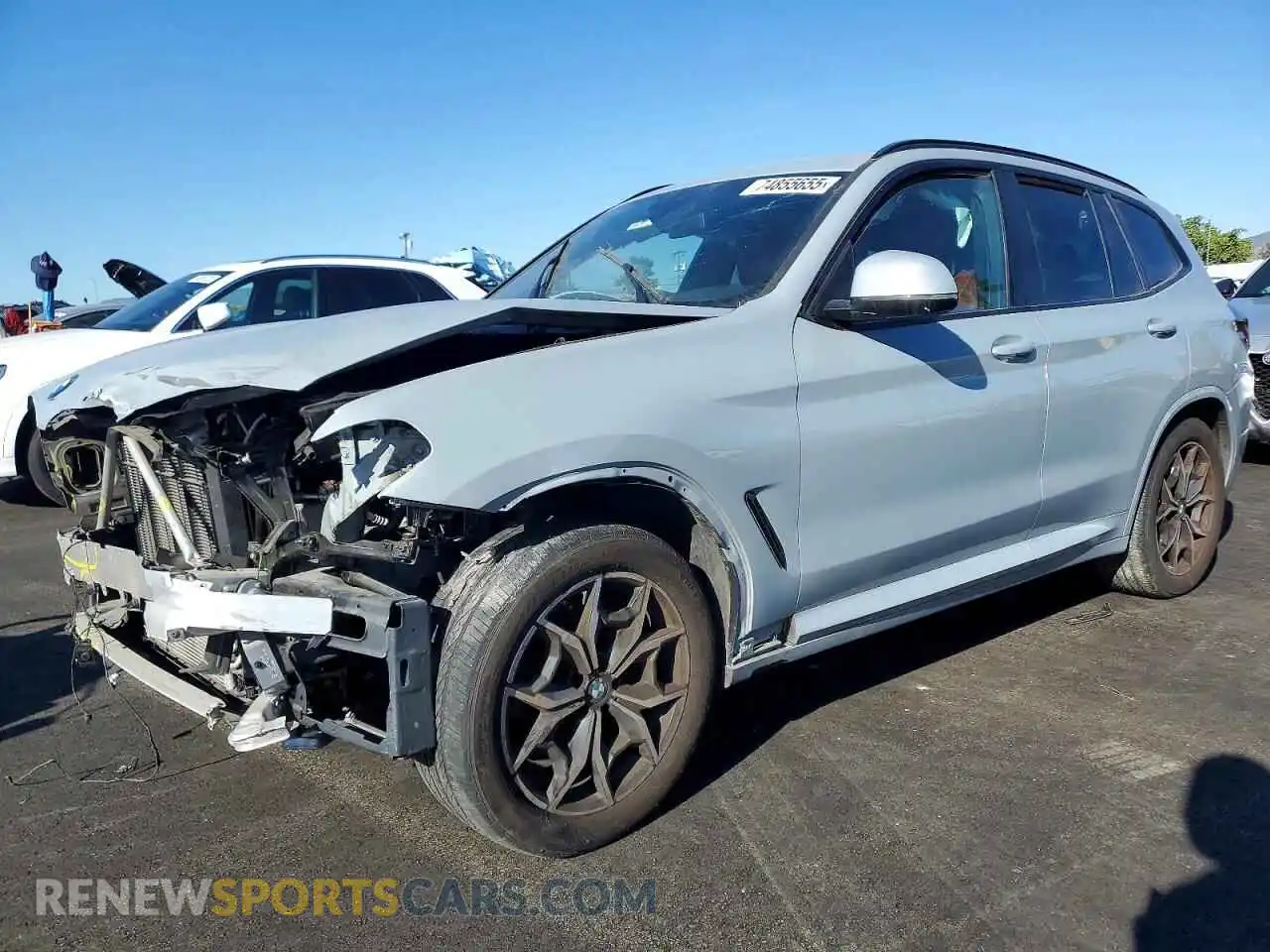 1 Photograph of a damaged car 5UX43DP00P9S93411 BMW X3 2023