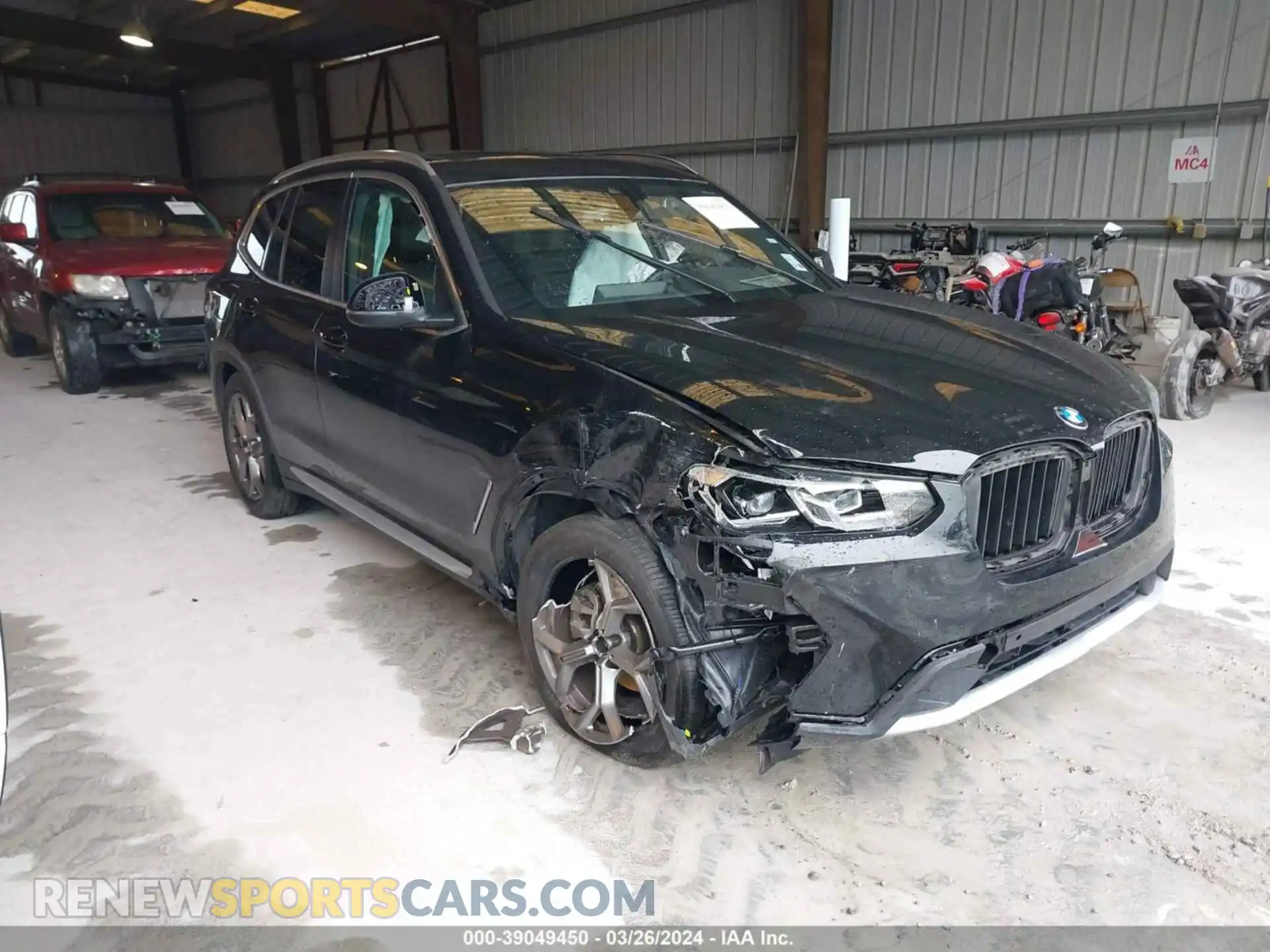 1 Photograph of a damaged car 5UX43DP02P9R45669 BMW X3 2023