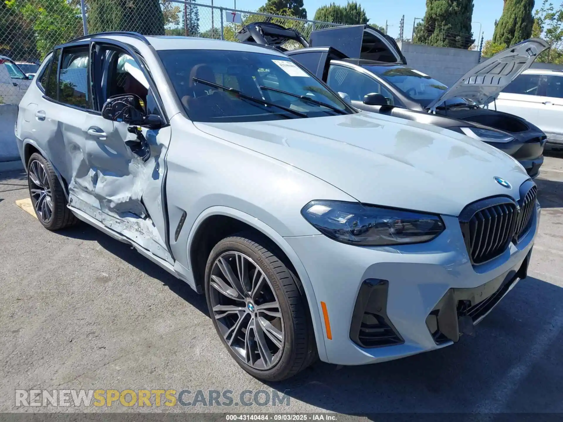 1 Photograph of a damaged car 5UX43DP02P9R73083 BMW X3 2023