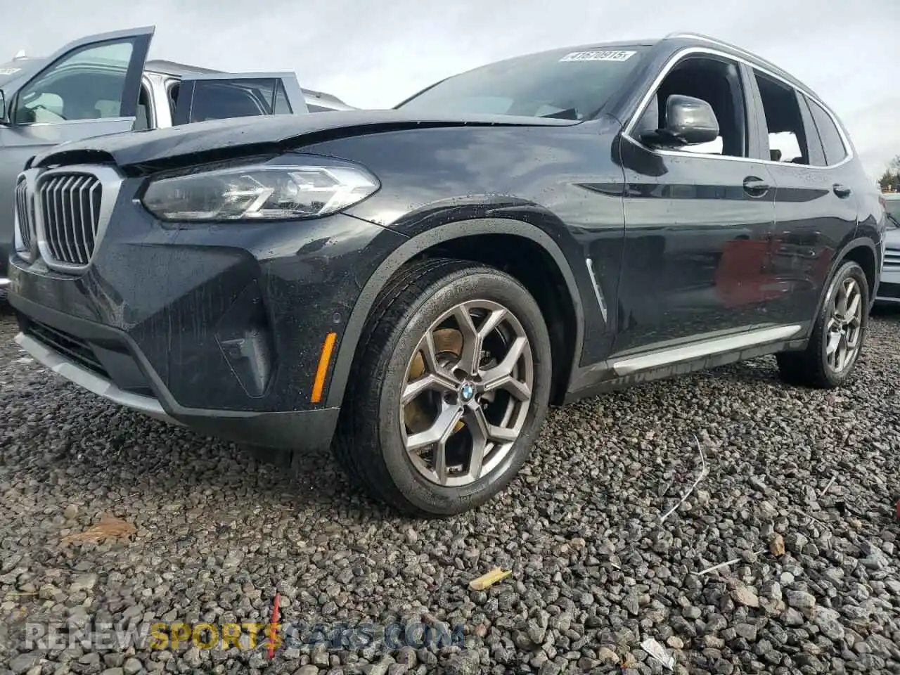 1 Photograph of a damaged car 5UX43DP02P9R90353 BMW X3 2023