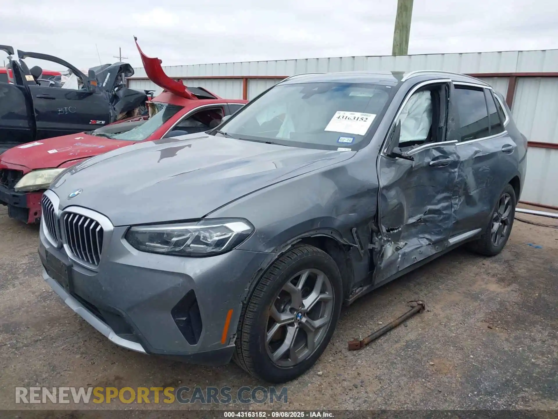 2 Photograph of a damaged car 5UX43DP02P9S24686 BMW X3 2023