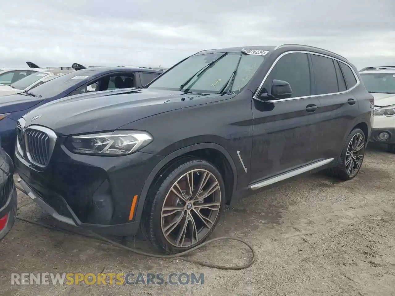 1 Photograph of a damaged car 5UX43DP03P9P89139 BMW X3 2023