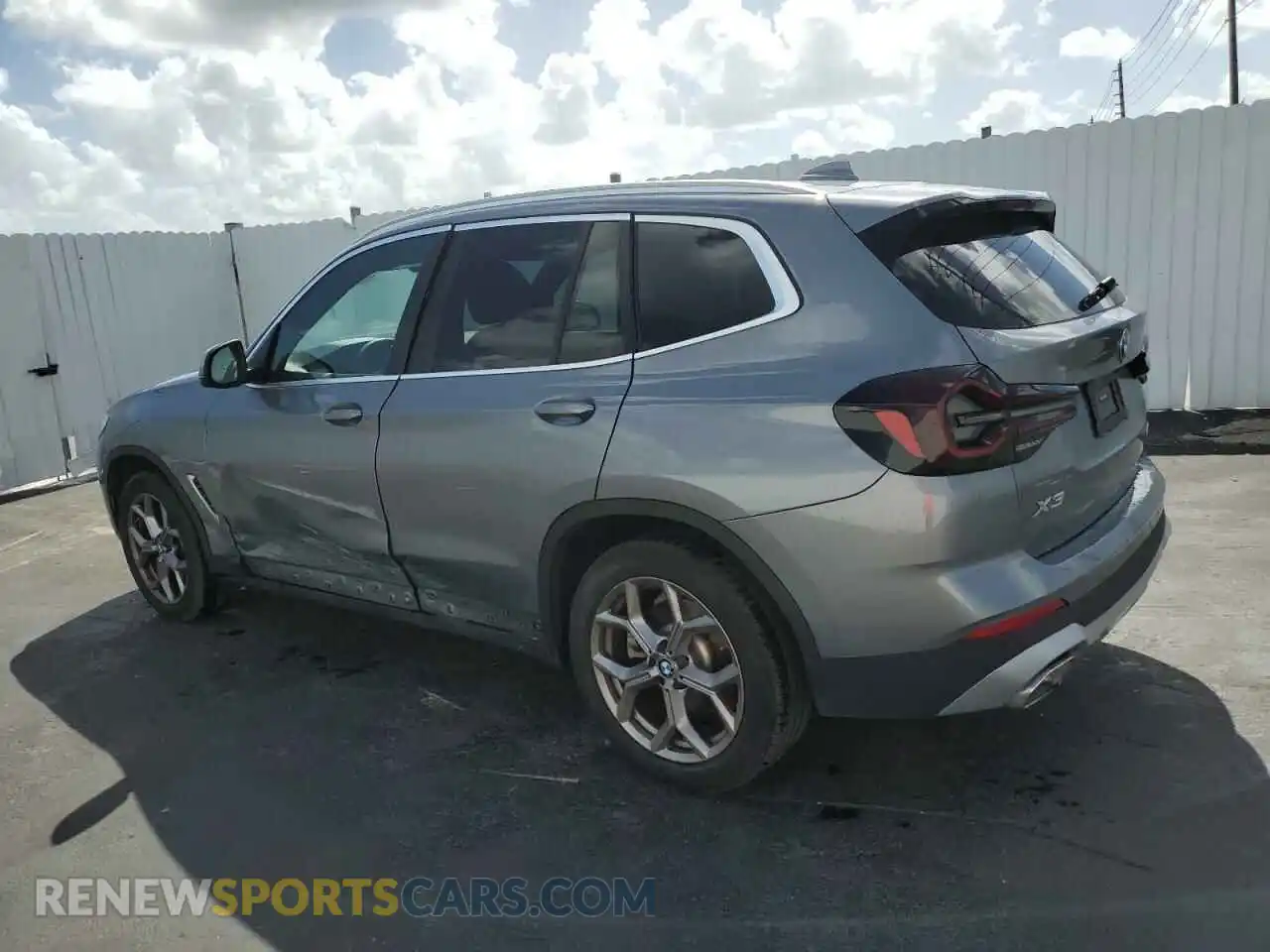 2 Photograph of a damaged car 5UX43DP03P9S10313 BMW X3 2023