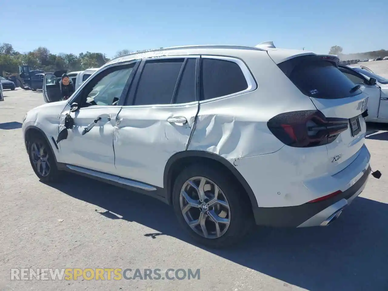 2 Photograph of a damaged car 5UX43DP04P9N79875 BMW X3 2023