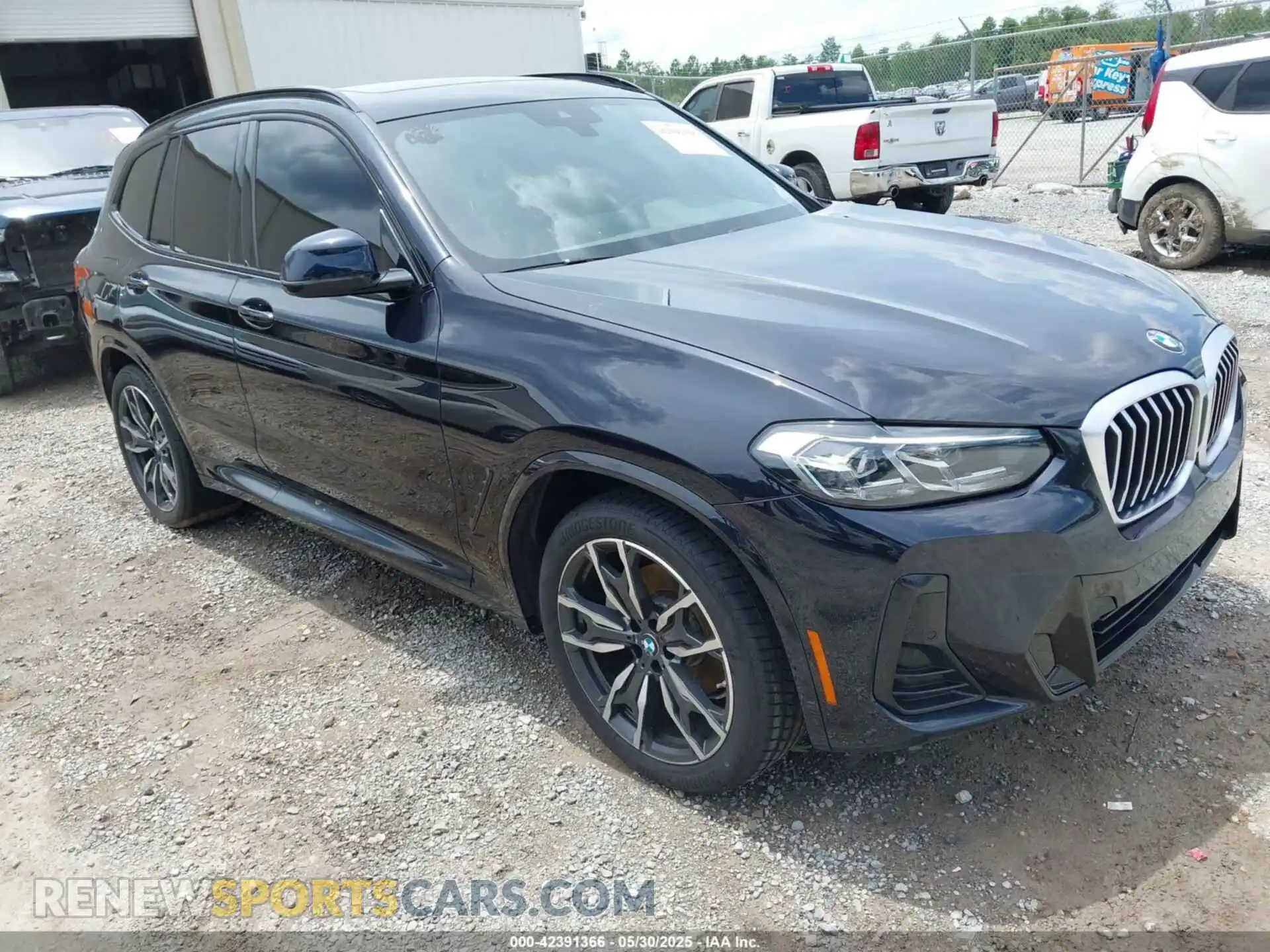 1 Photograph of a damaged car 5UX43DP04P9P03885 BMW X3 2023