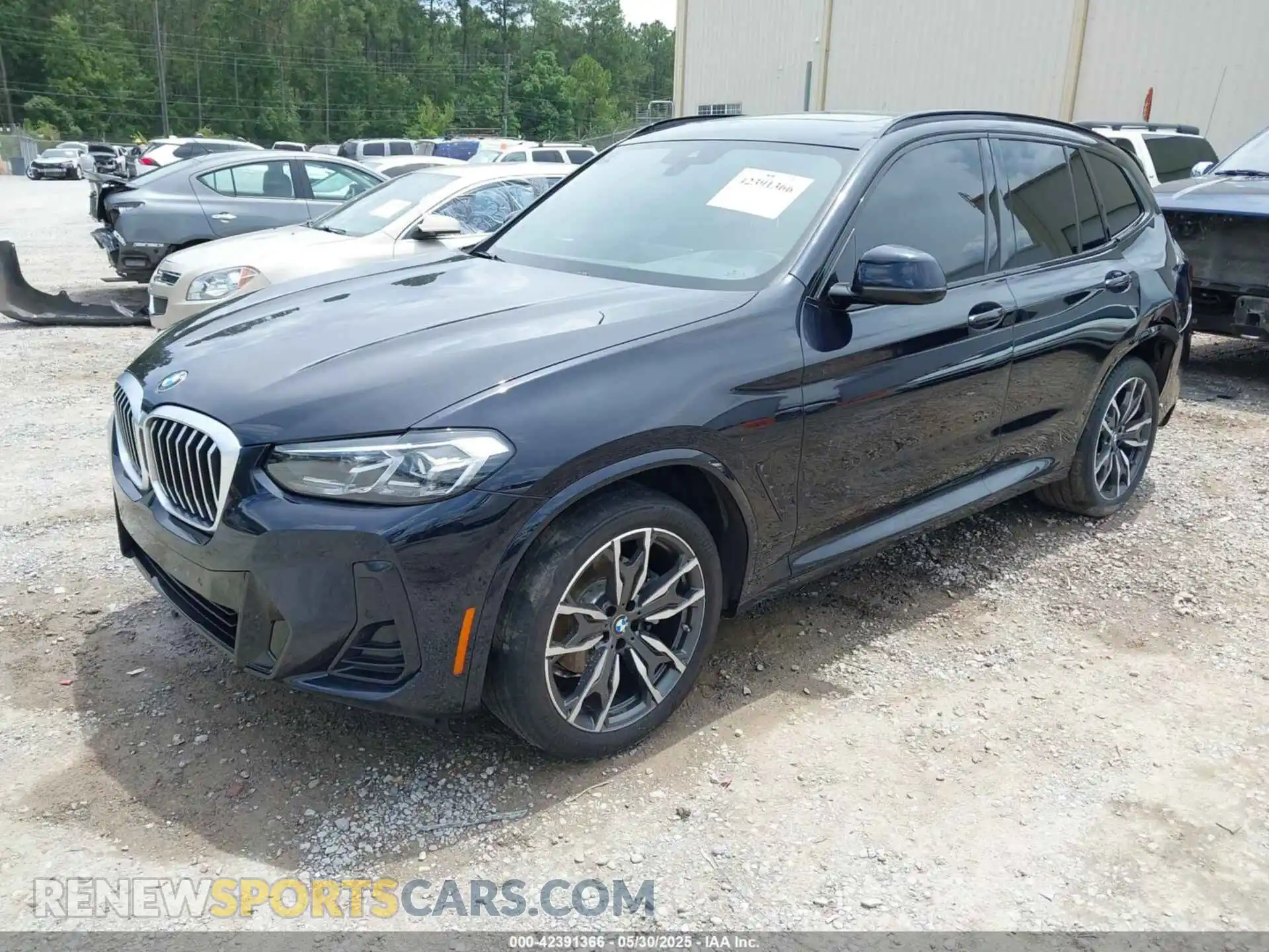 2 Photograph of a damaged car 5UX43DP04P9P03885 BMW X3 2023
