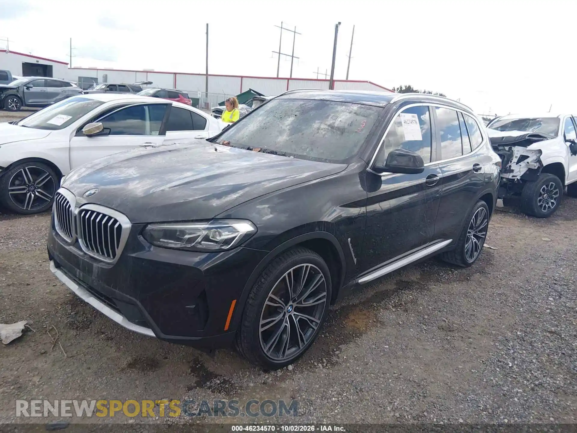 2 Photograph of a damaged car 5UX43DP04P9R90659 BMW X3 2023