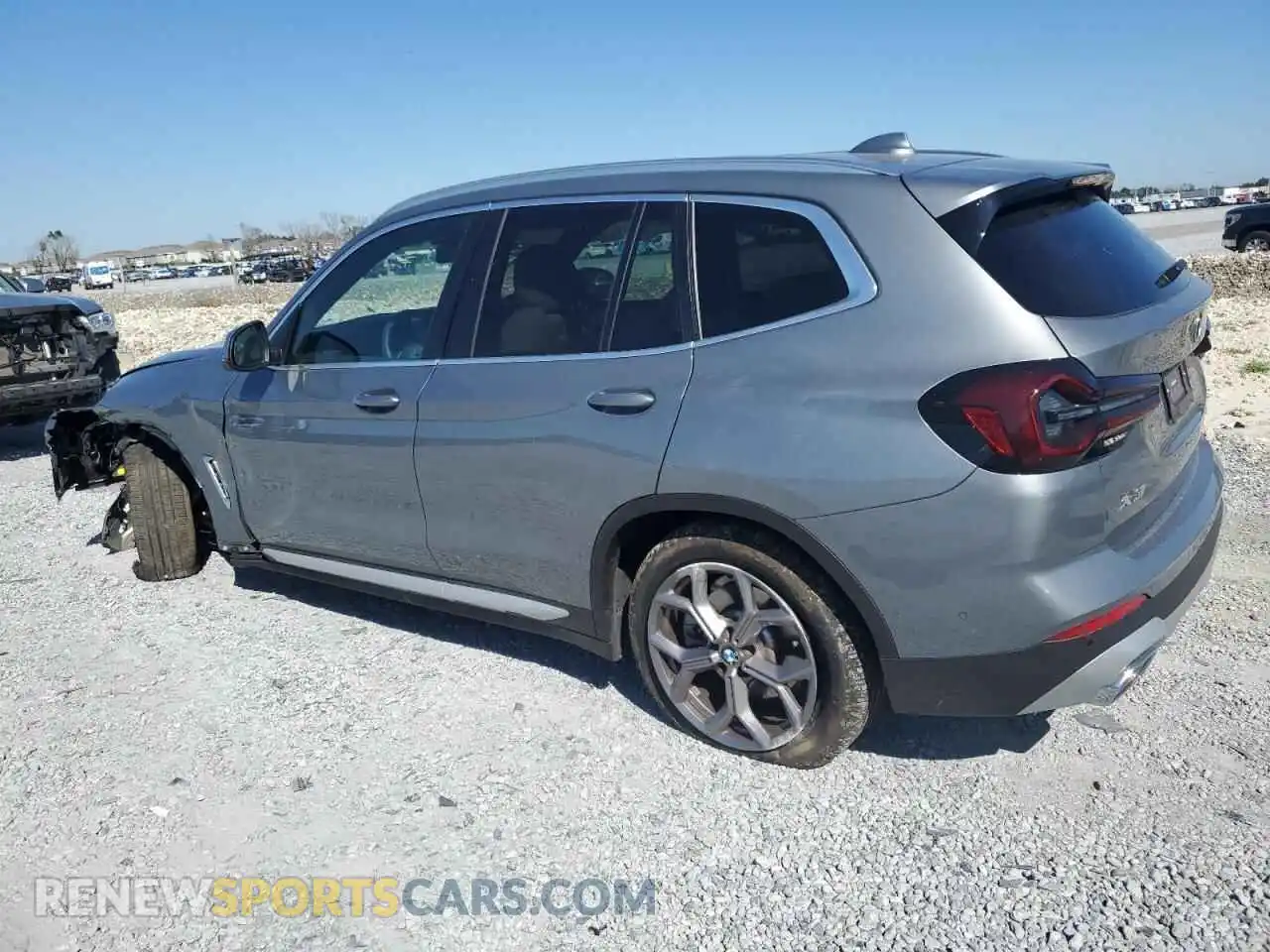 2 Photograph of a damaged car 5UX43DP05P9T00207 BMW X3 2023