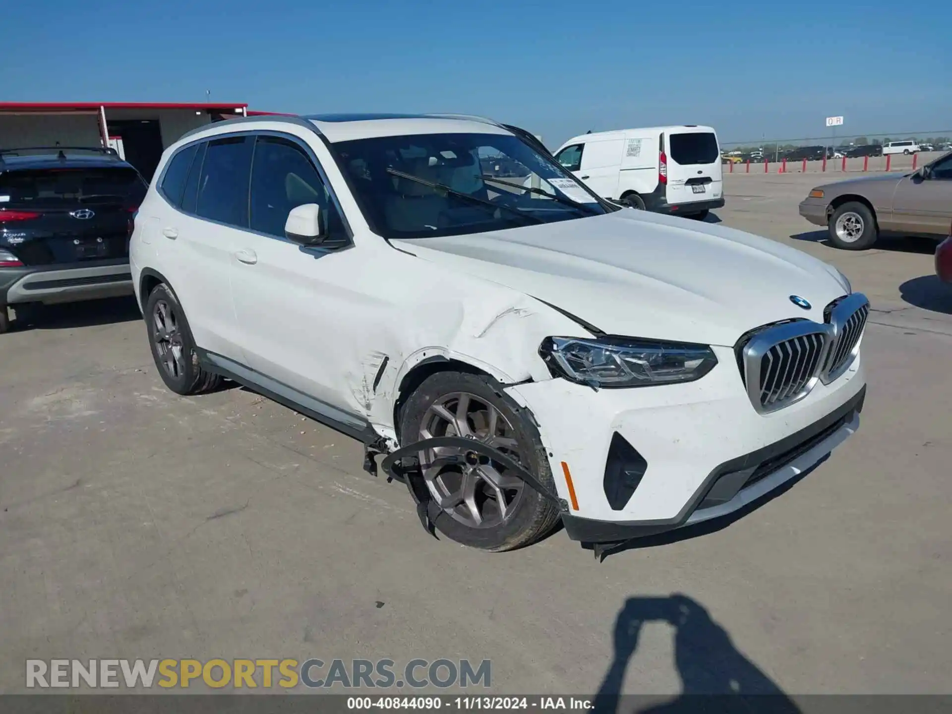 1 Photograph of a damaged car 5UX43DP06P9R03859 BMW X3 2023