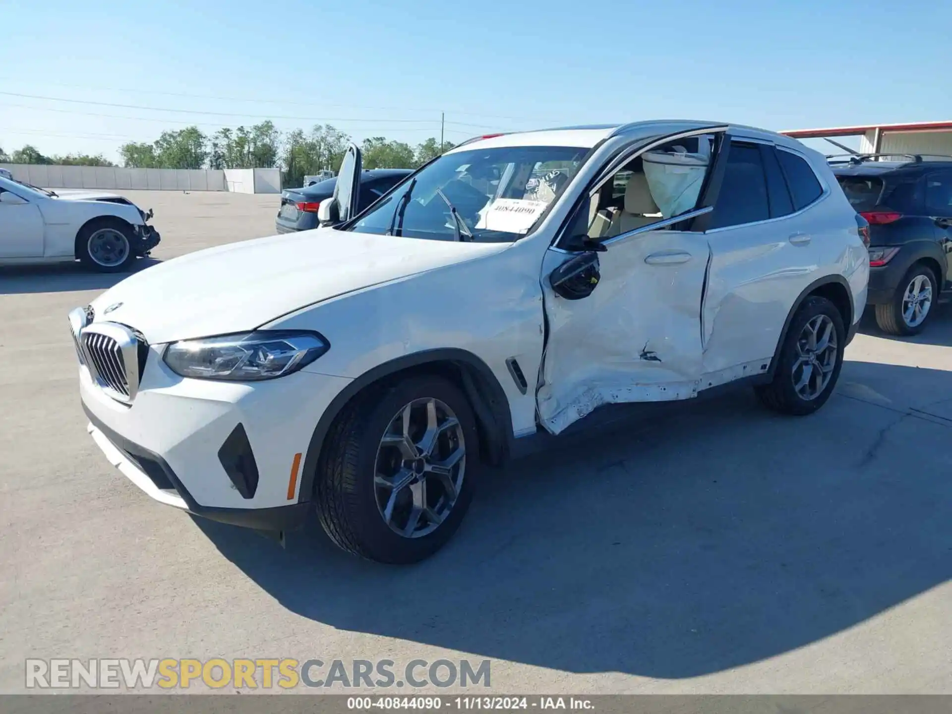 2 Photograph of a damaged car 5UX43DP06P9R03859 BMW X3 2023