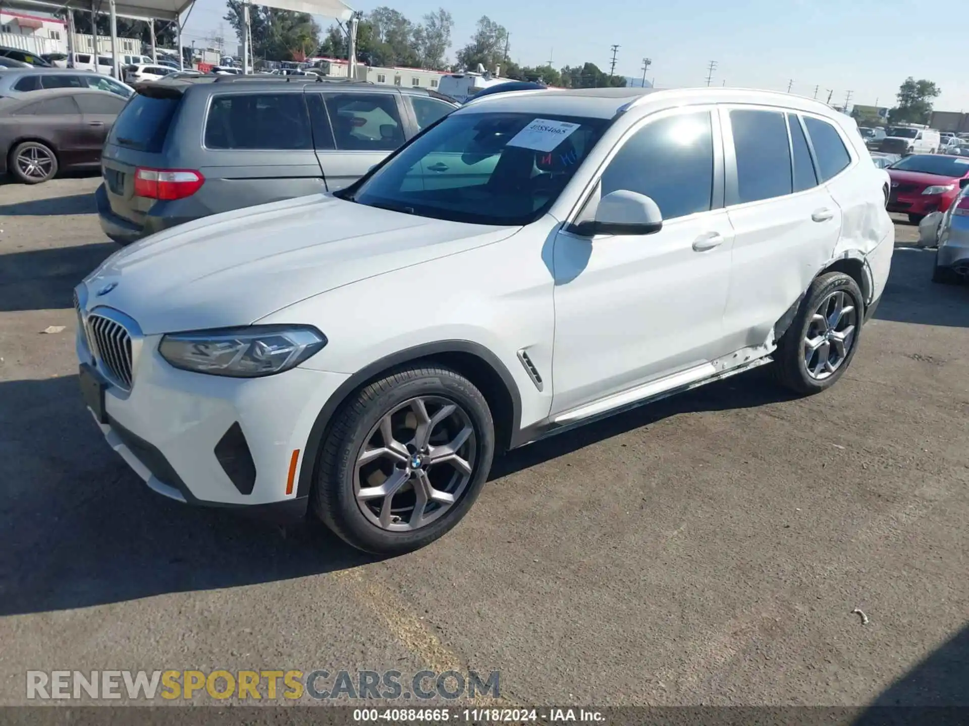 2 Photograph of a damaged car 5UX43DP07P9N54744 BMW X3 2023