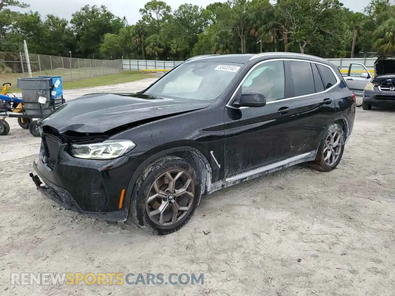 1 Photograph of a damaged car 5UX43DP07P9R03806 BMW X3 2023