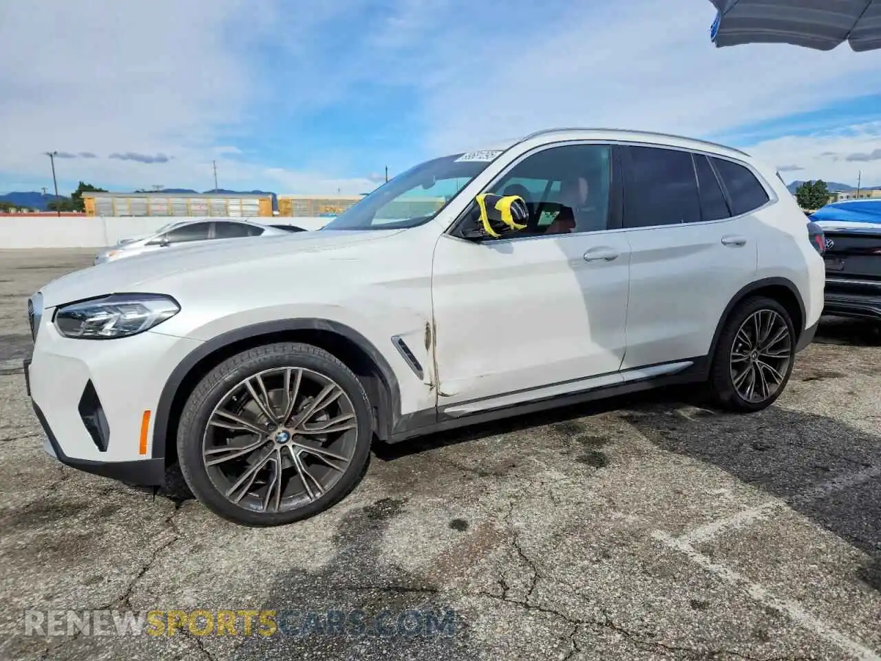 1 Photograph of a damaged car 5UX43DP07P9R65724 BMW X3 2023