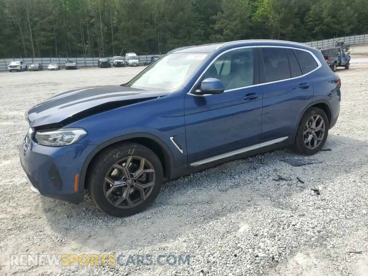 1 Photograph of a damaged car 5UX43DP07P9S19242 BMW X3 2023