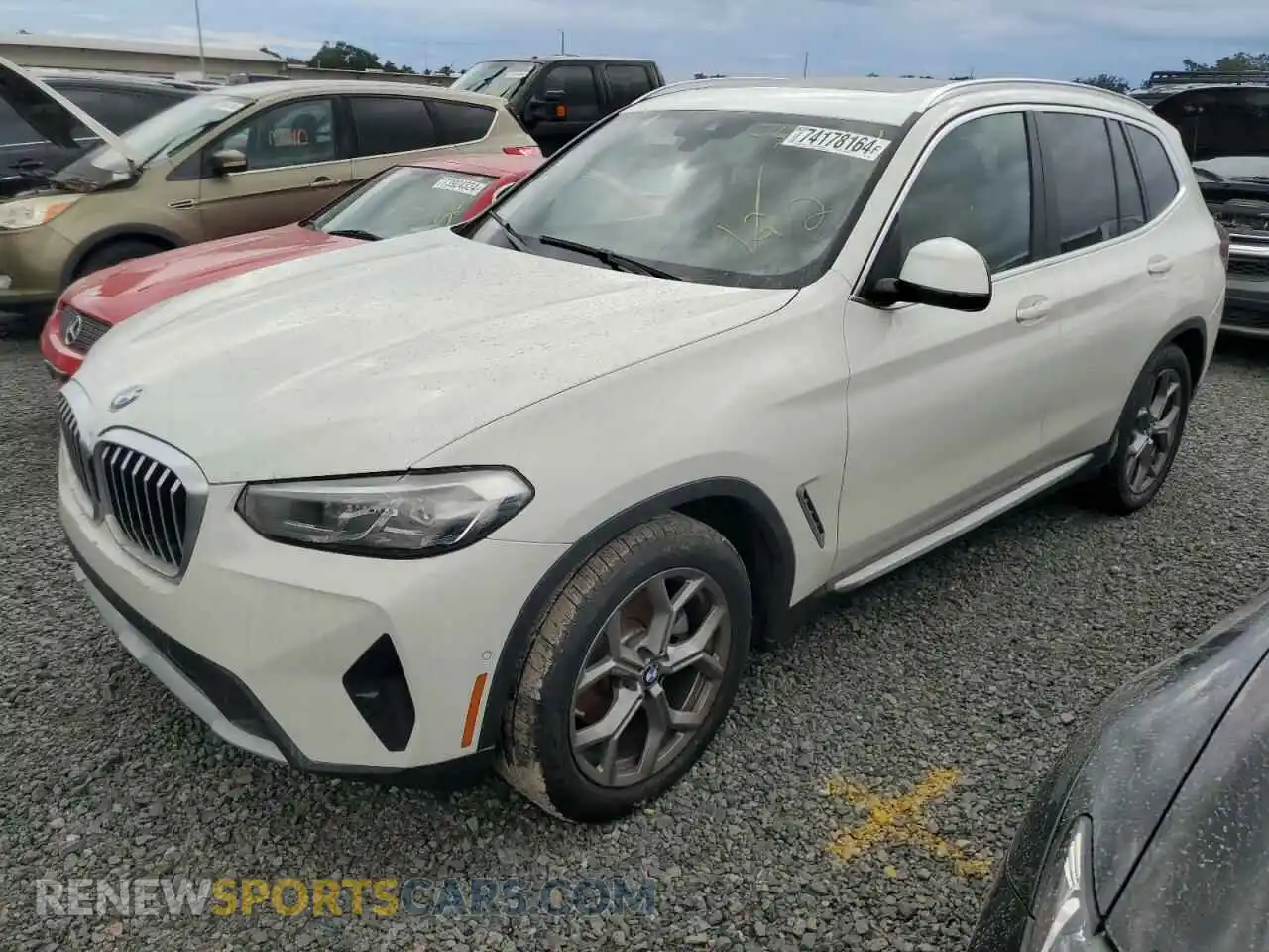 1 Photograph of a damaged car 5UX43DP08P9S90109 BMW X3 2023