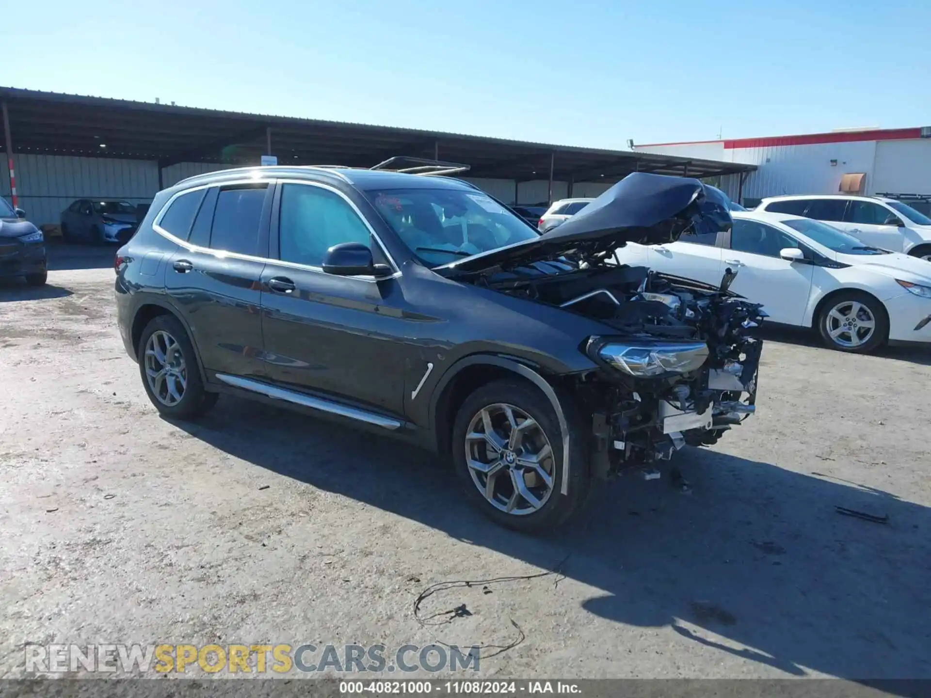 1 Photograph of a damaged car 5UX43DP08P9T15915 BMW X3 2023