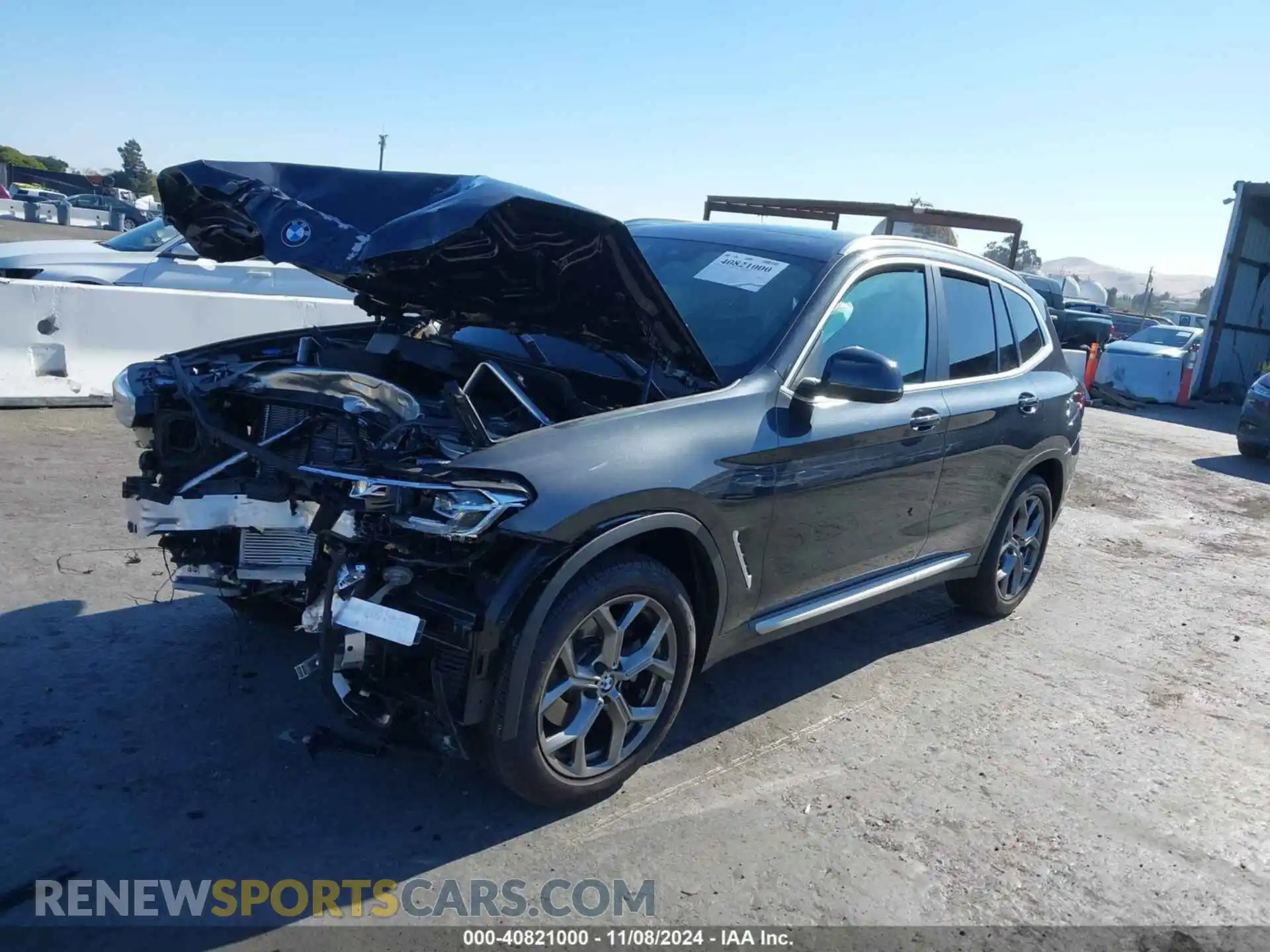2 Photograph of a damaged car 5UX43DP08P9T15915 BMW X3 2023