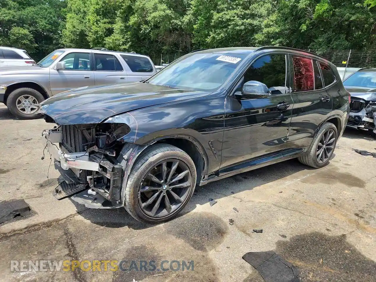 1 Photograph of a damaged car 5UX43DP09P9S64005 BMW X3 2023