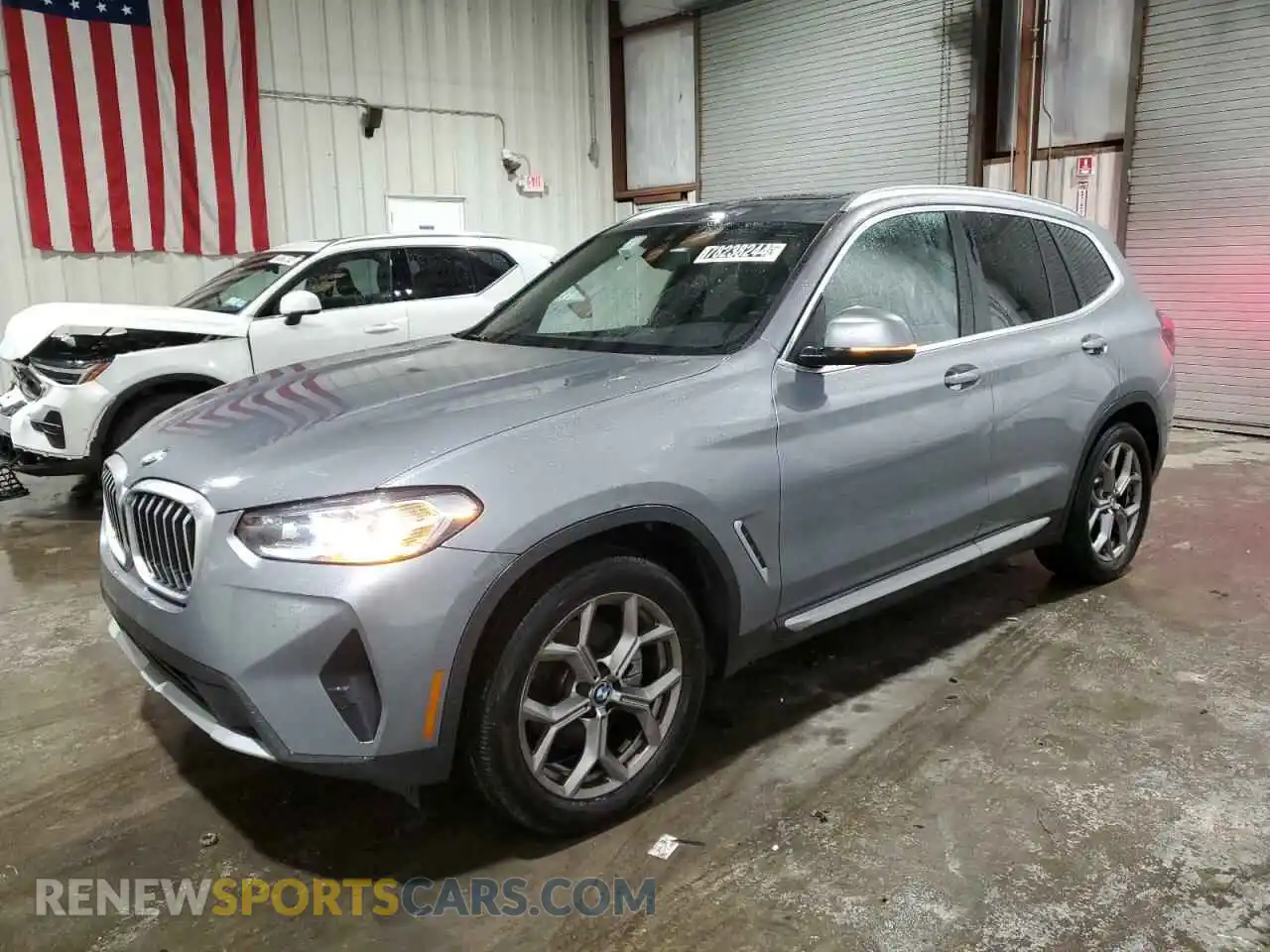 1 Photograph of a damaged car 5UX53DP01P9R75587 BMW X3 2023