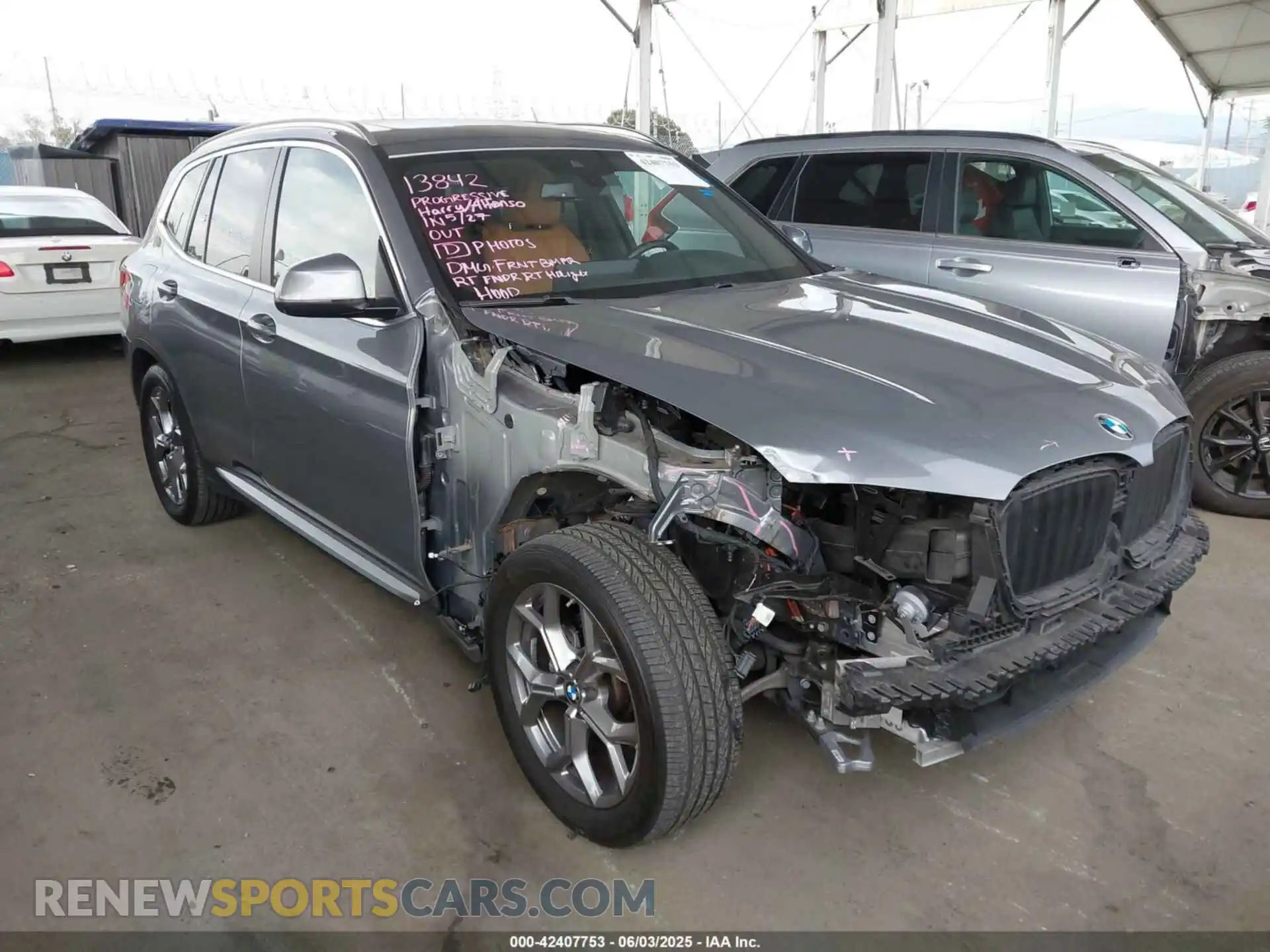 1 Photograph of a damaged car 5UX53DP02P9P22312 BMW X3 2023
