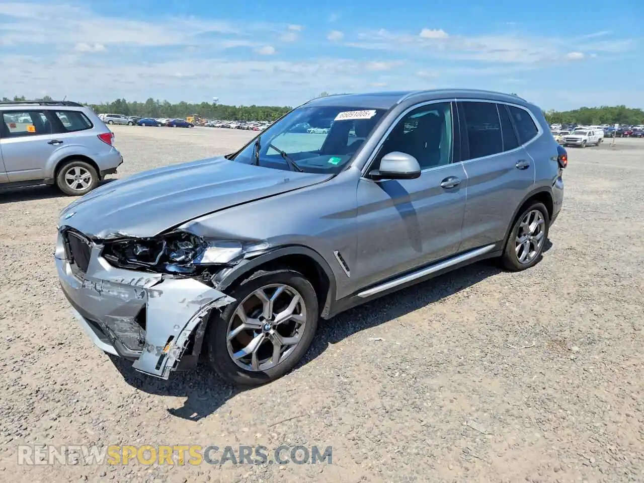 1 Photograph of a damaged car 5UX53DP02P9S69132 BMW X3 2023