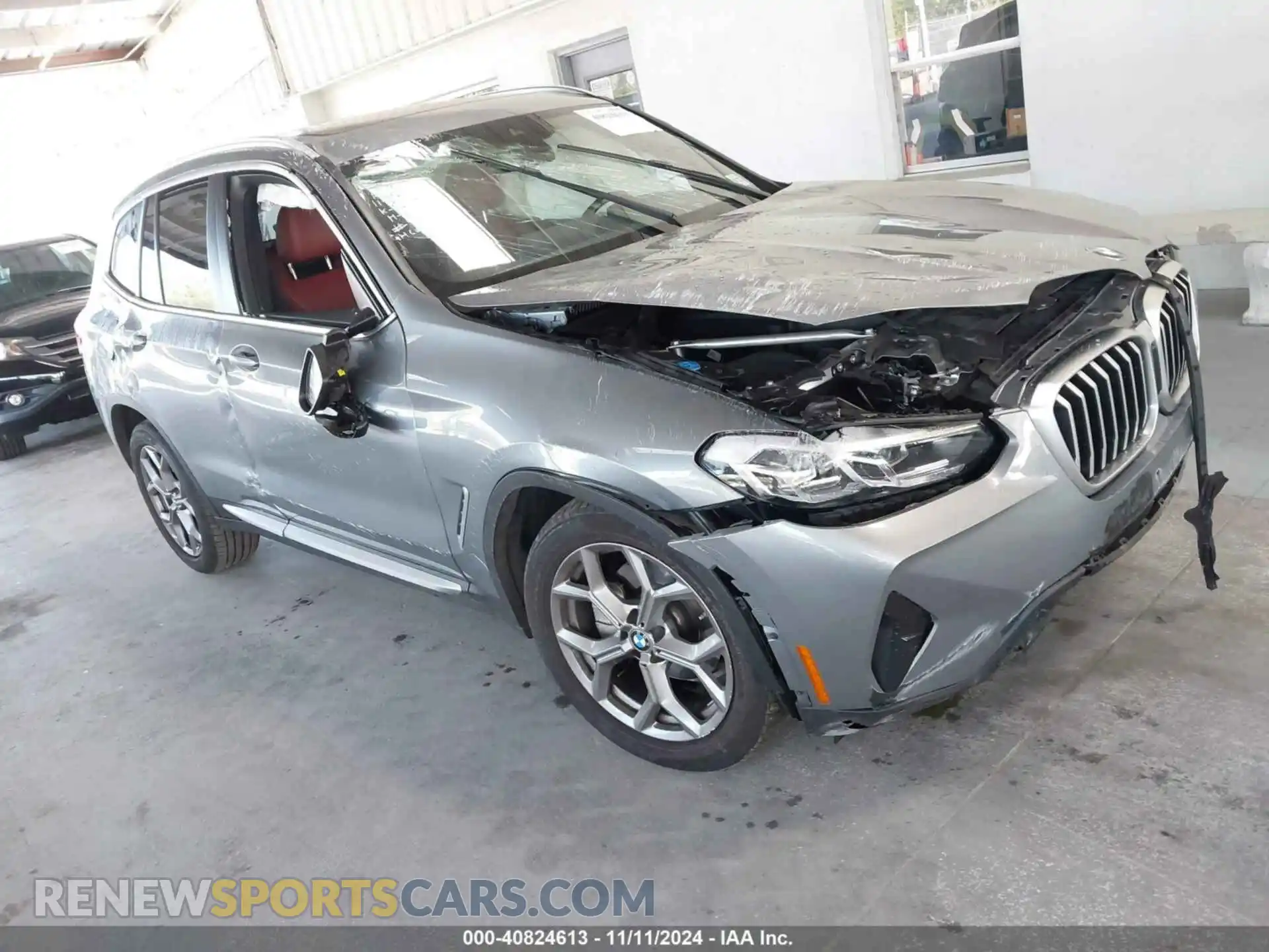 1 Photograph of a damaged car 5UX53DP04P9N70744 BMW X3 2023