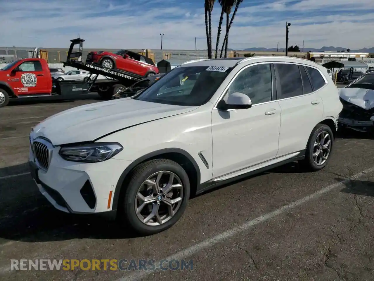 1 Photograph of a damaged car 5UX53DP04P9P09691 BMW X3 2023