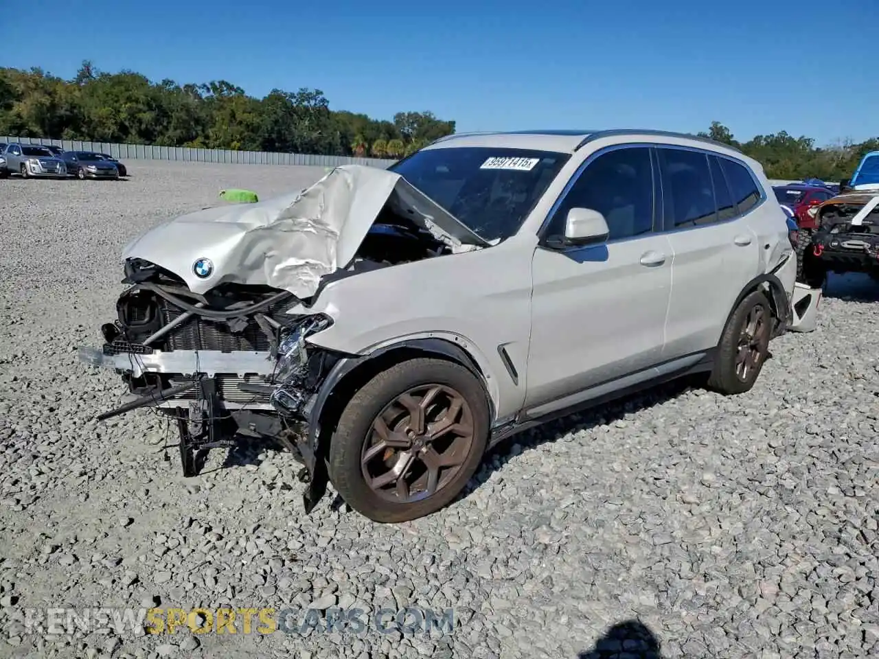 1 Photograph of a damaged car 5UX53DP04P9P42450 BMW X3 2023