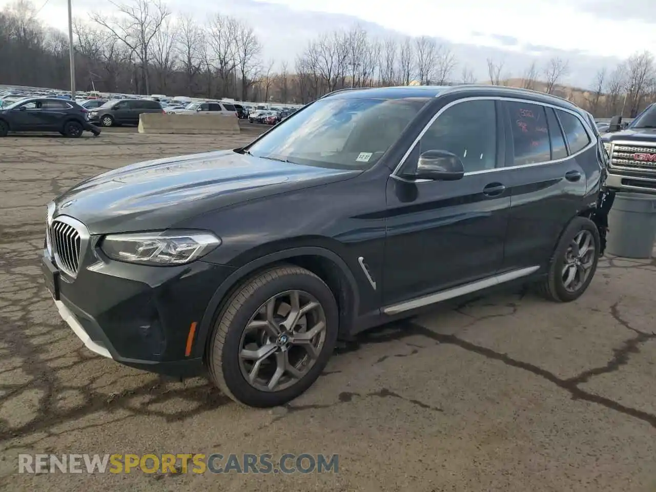 1 Photograph of a damaged car 5UX53DP04P9P80941 BMW X3 2023