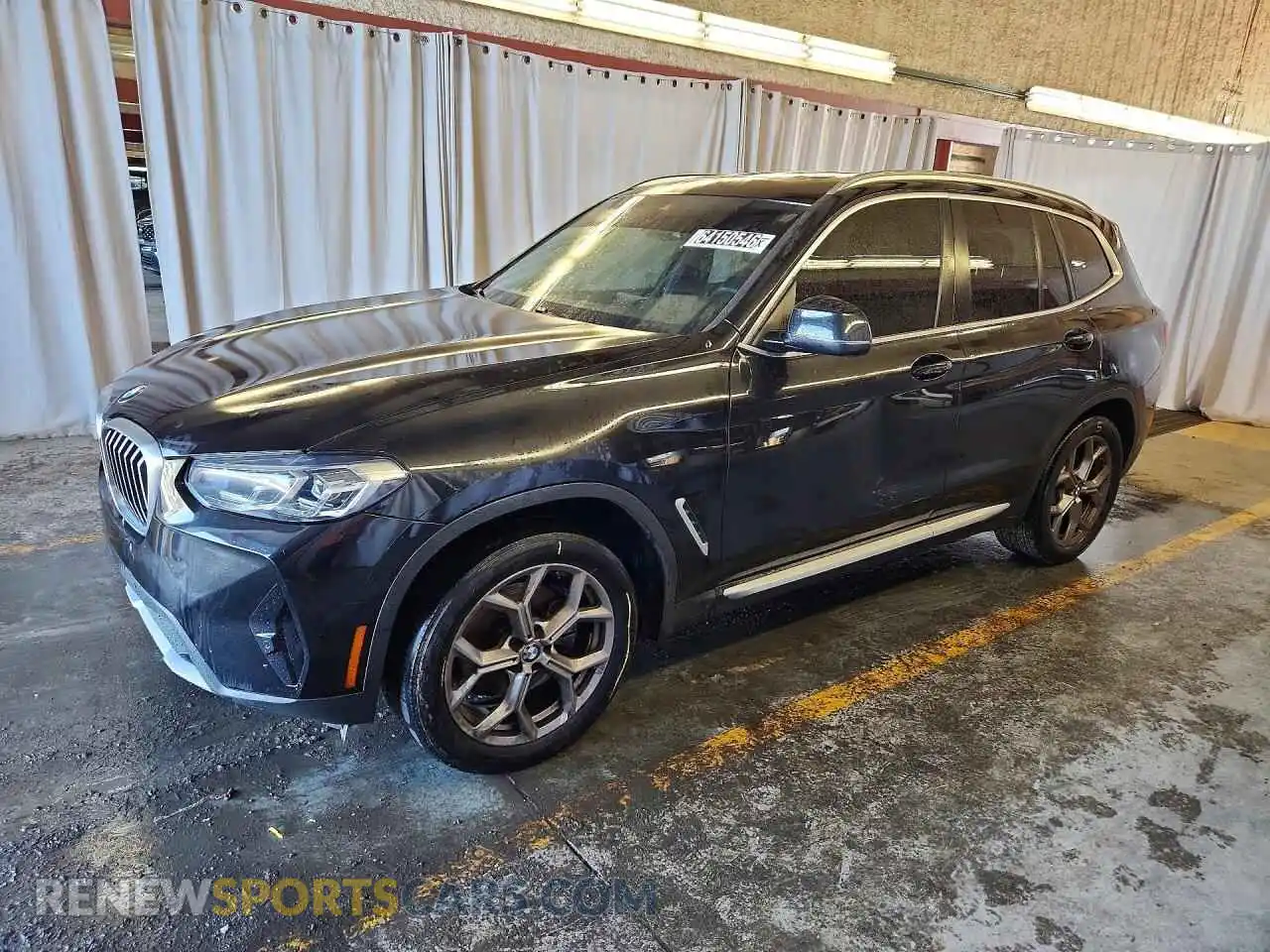 1 Photograph of a damaged car 5UX53DP04P9S10230 BMW X3 2023