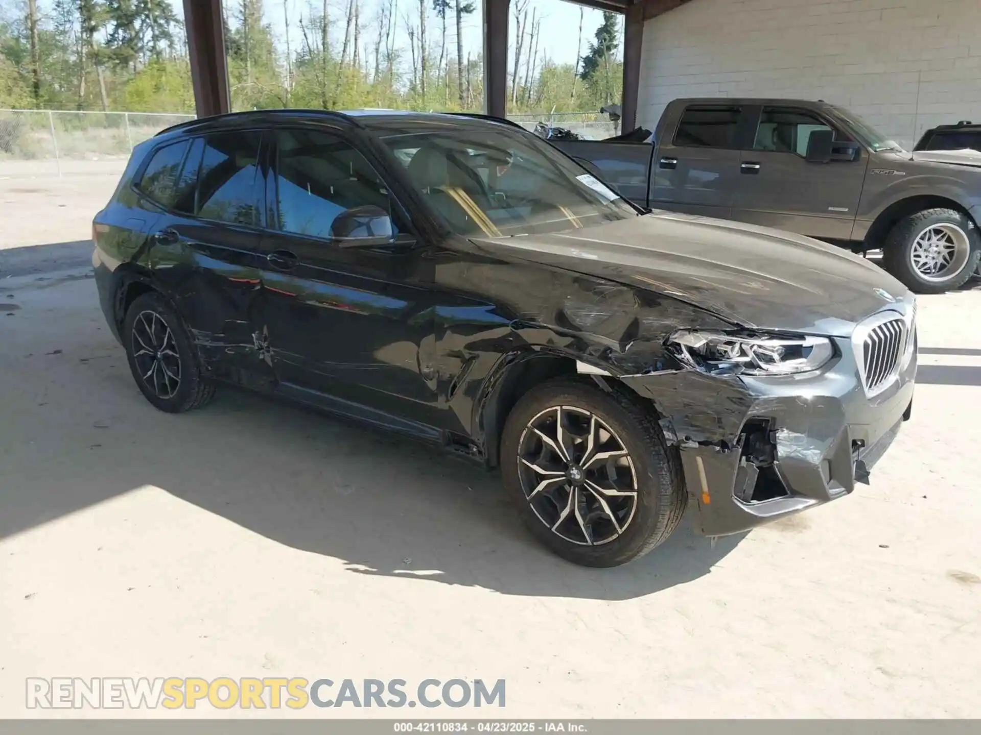 1 Photograph of a damaged car 5UX53DP04P9T10635 BMW X3 2023