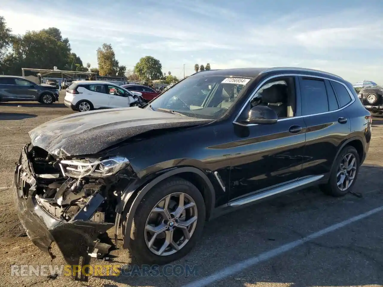 1 Photograph of a damaged car 5UX53DP06P9N75816 BMW X3 2023