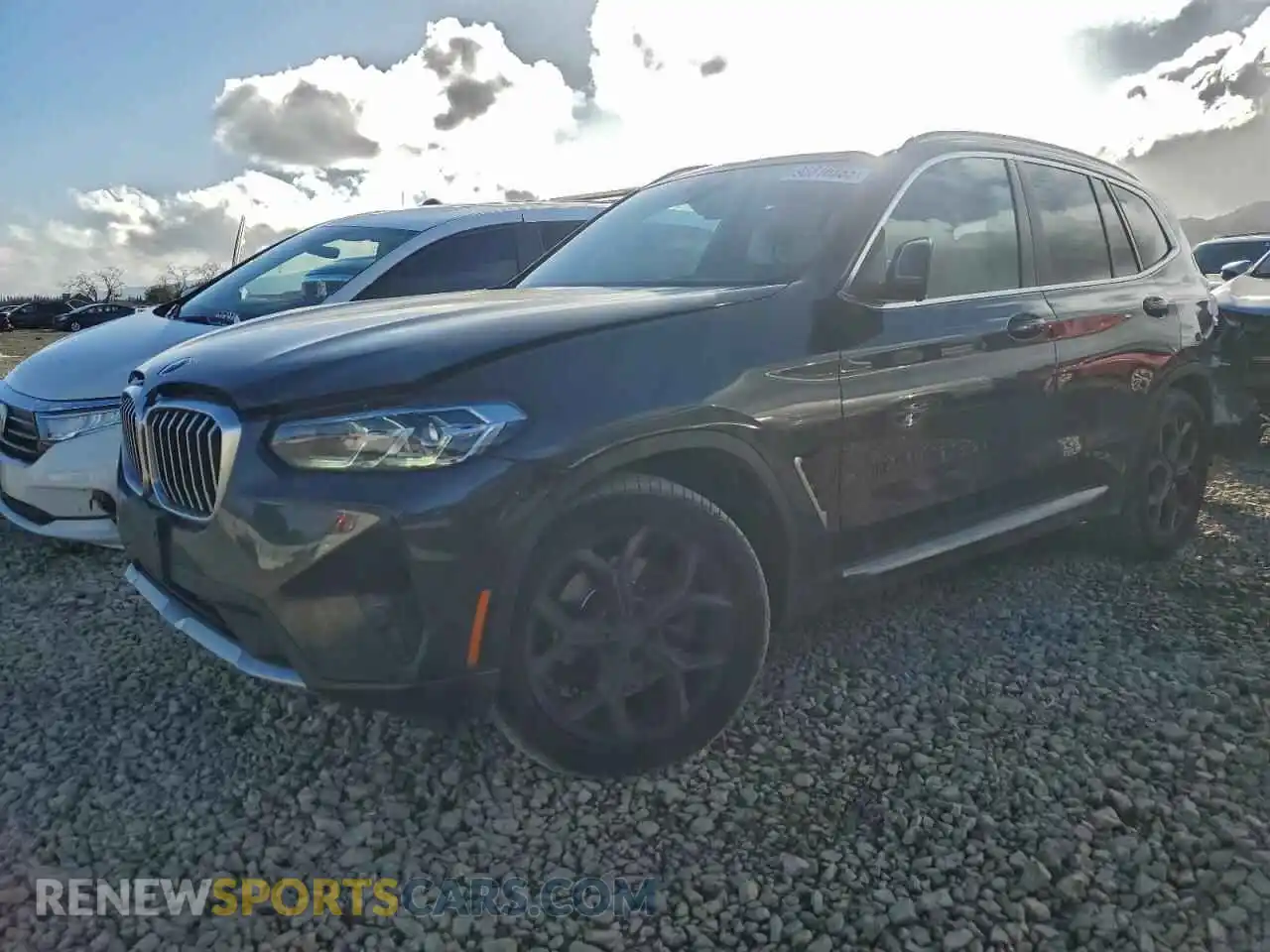 1 Photograph of a damaged car 5UX53DP06P9R23811 BMW X3 2023