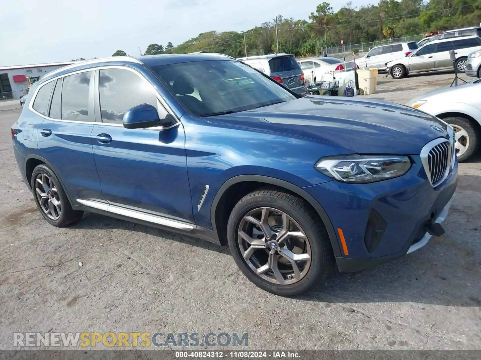 1 Photograph of a damaged car 5UX53DP07P9P58710 BMW X3 2023