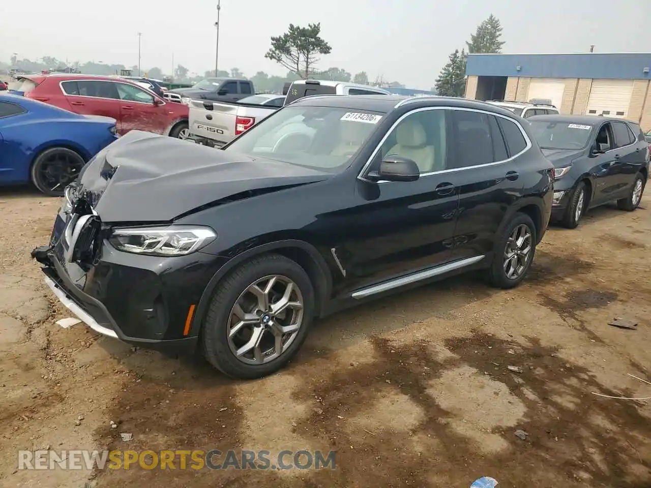 1 Photograph of a damaged car 5UX53DP08P9N63344 BMW X3 2023