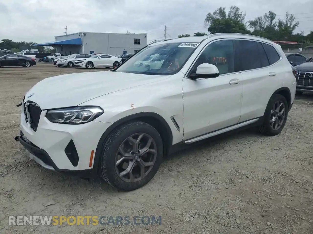 1 Photograph of a damaged car 5UX53DP09P9N51882 BMW X3 2023