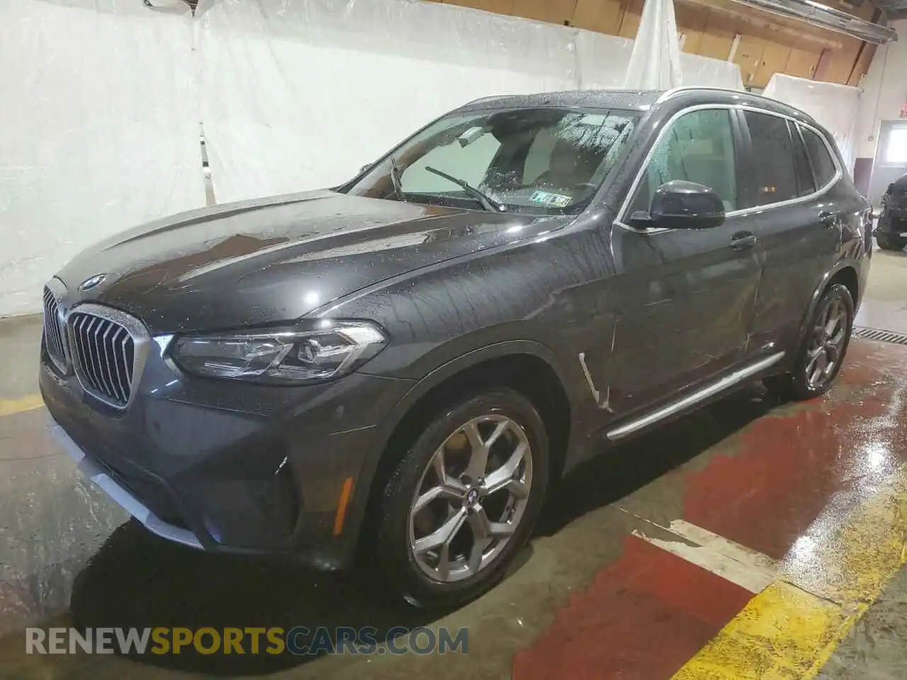1 Photograph of a damaged car 5UX53DP09P9R75434 BMW X3 2023