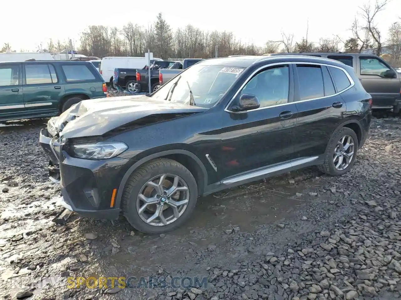 1 Photograph of a damaged car 5UX53DP0XP9R82067 BMW X3 2023