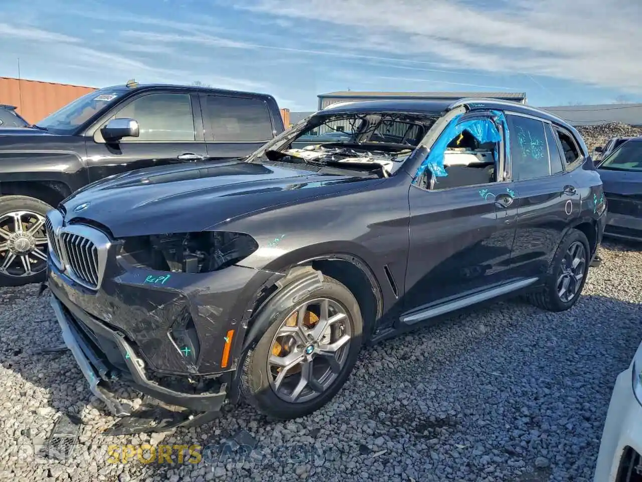 1 Photograph of a damaged car WBX57DP06PN243858 BMW X3 2023