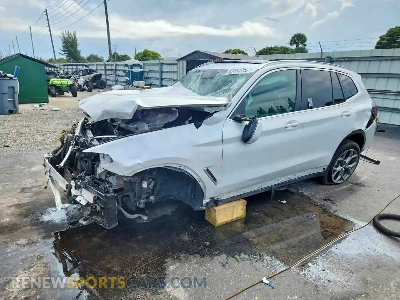 1 Photograph of a damaged car 5UX43DP02R9V07804 BMW X3 2024