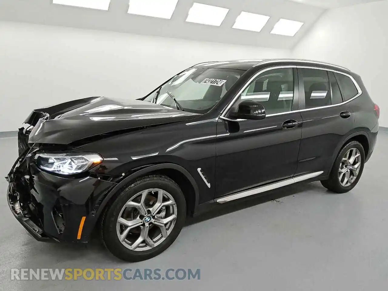 1 Photograph of a damaged car 5UX43DP03R9W18037 BMW X3 2024