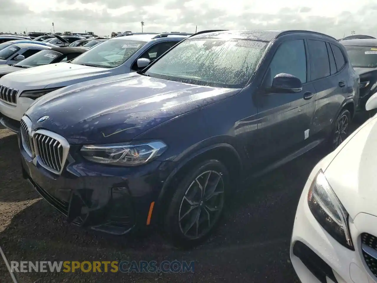 1 Photograph of a damaged car 5UX43DP04R9U84462 BMW X3 2024